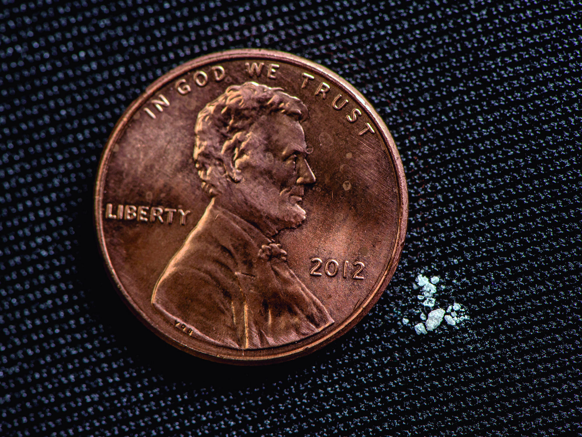 A small but deadly dose of fentanyl next to a penny